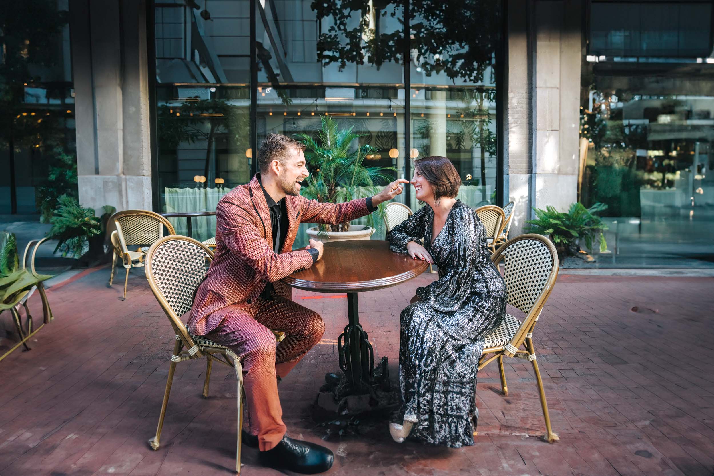 groom touching bride's nose before their elopement in the French Quarter of New Orleans