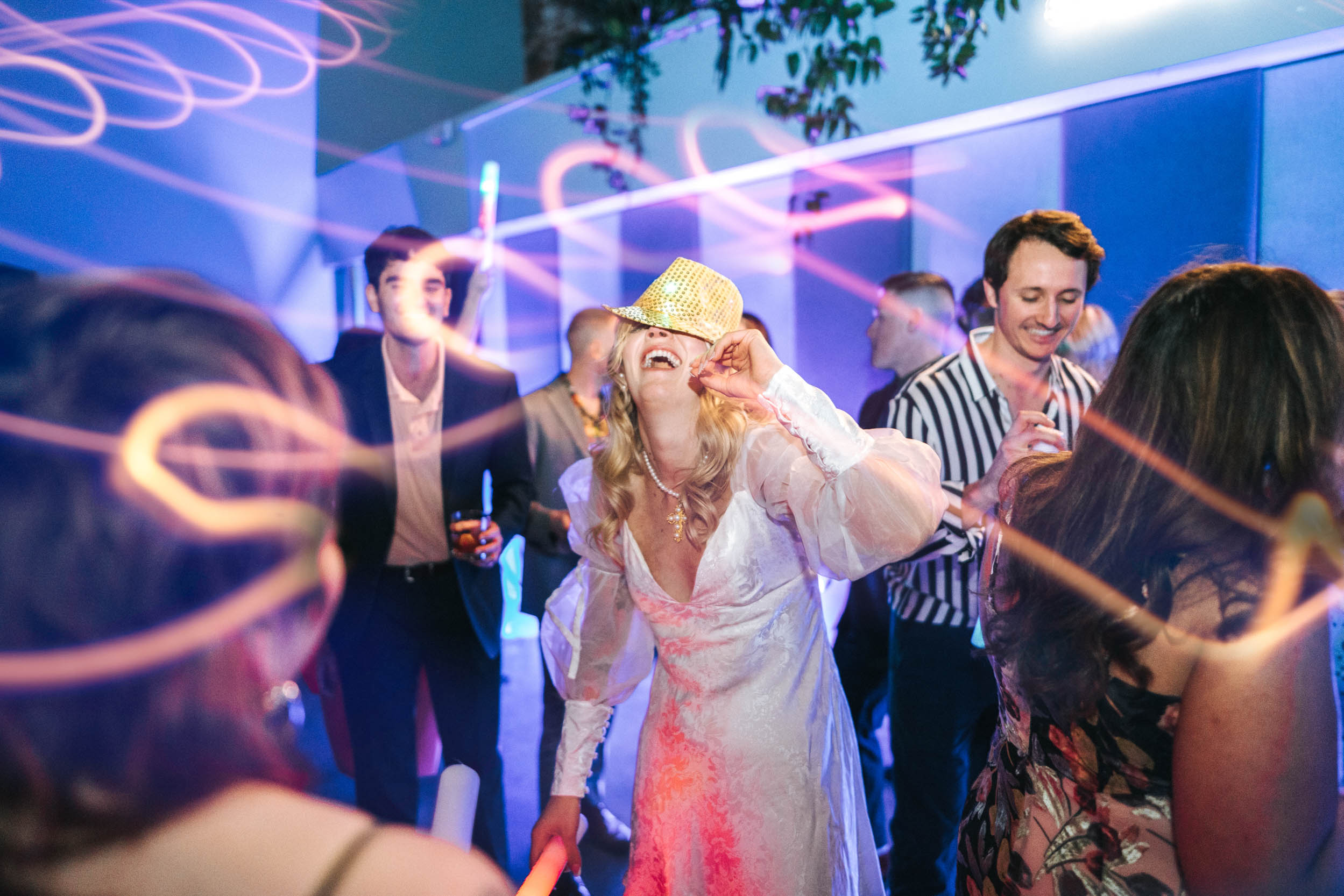 Bride dancing and laughing at Capulet in New Orleans