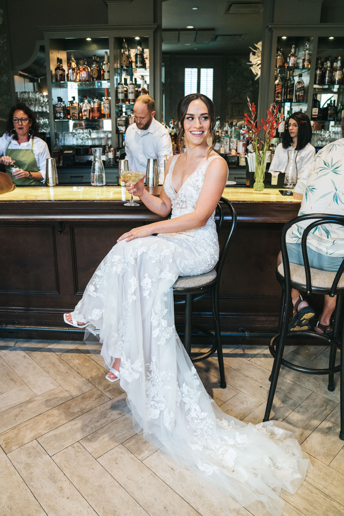 bride drinking martini at the bar in The Southern Hotel in Covington, Louisiana