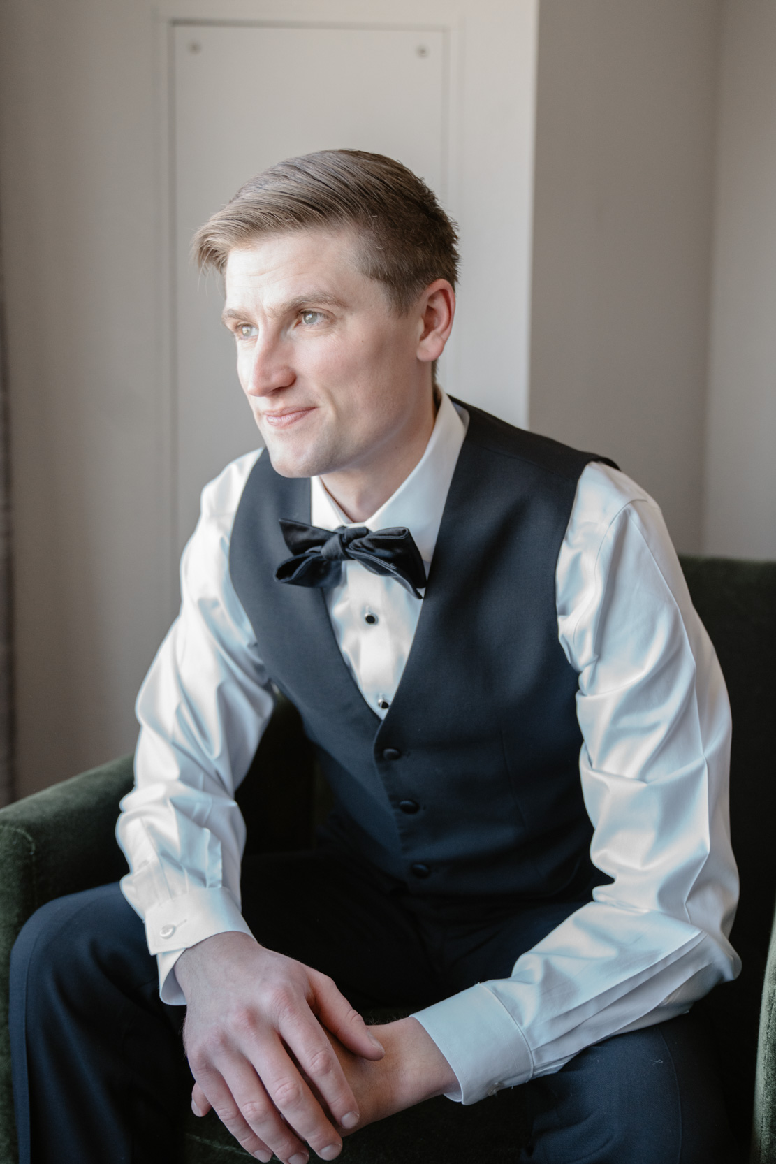 groom getting ready in tuxedo at the Hotel Fontenot in New Orleans