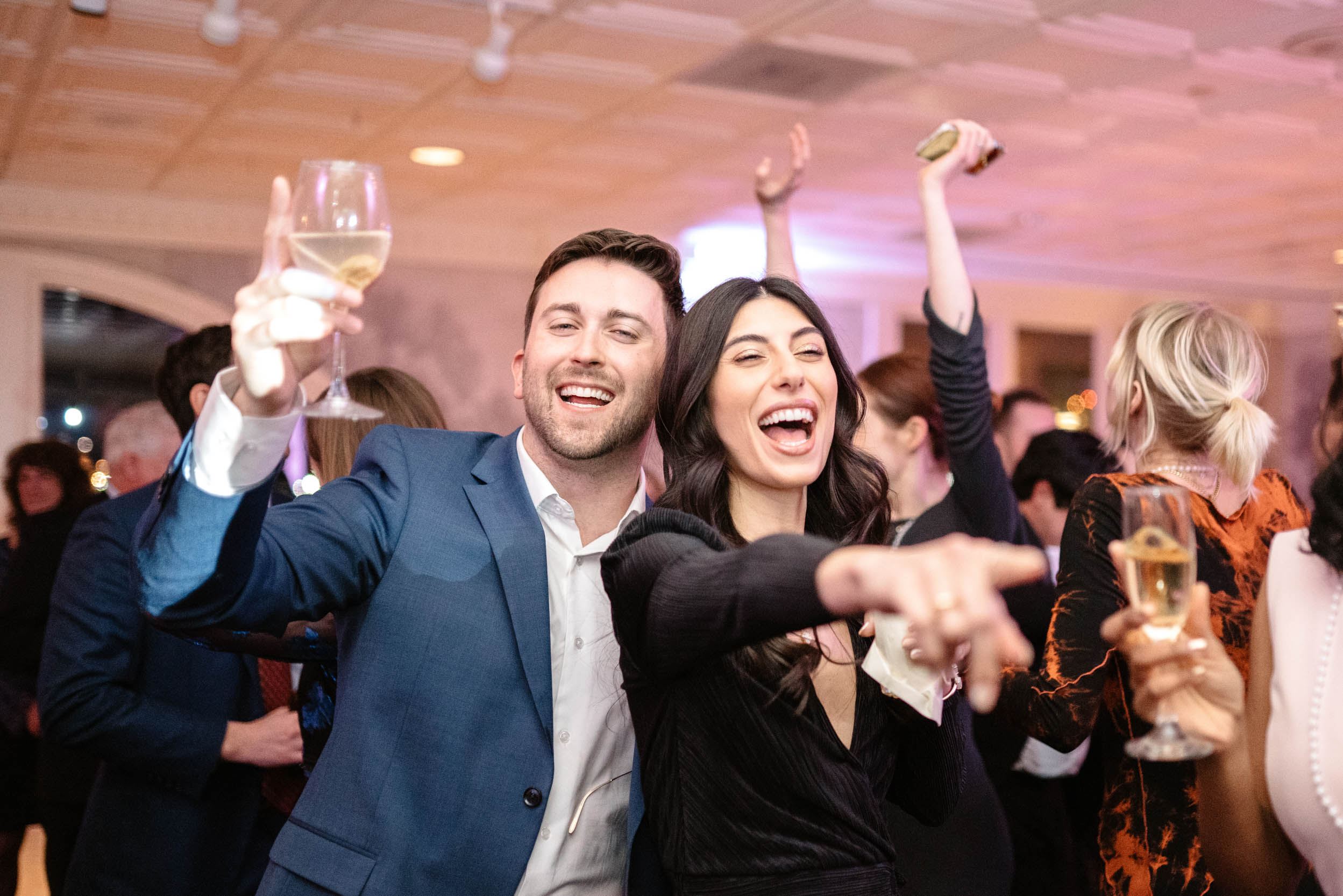 wedding guests dancing during reception at the Riverview Room in New Orleans