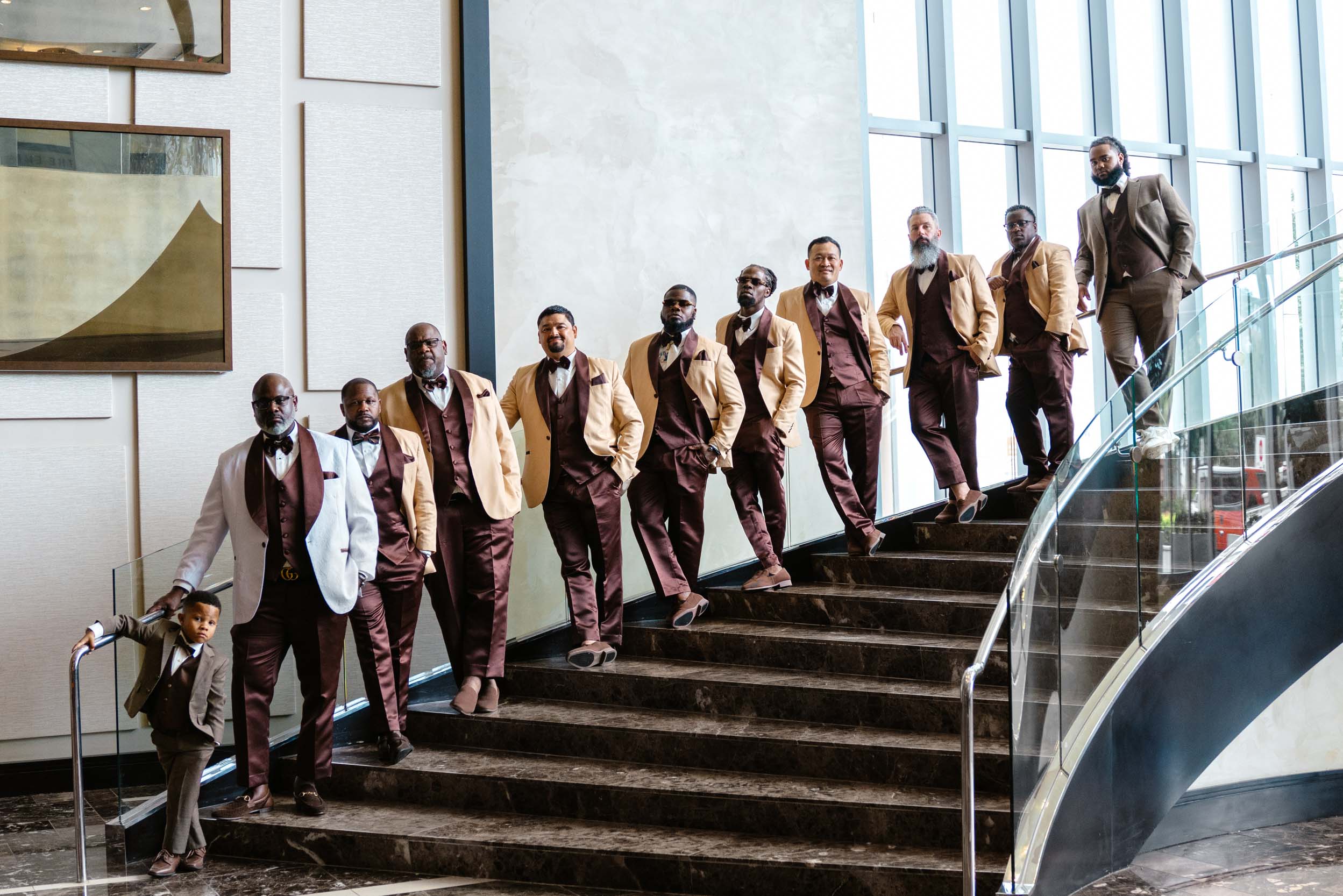 African American groomsmen lining up on stairs at the Hyatt Regency New Orleans