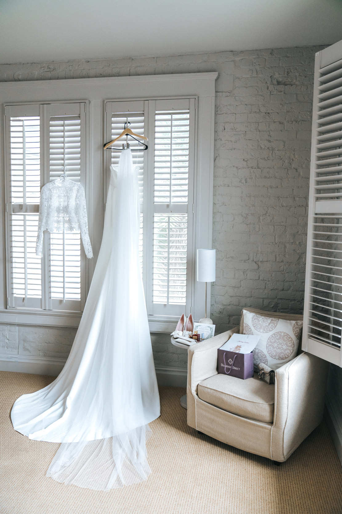 bridal gown, Chantilly wedding dress, Ted Baker London shoes, Diamonds Direct jewelry, Gucci purse, and 1965 Ashley Sievert glasses at the Southern Hotel in Covington, Louisiana