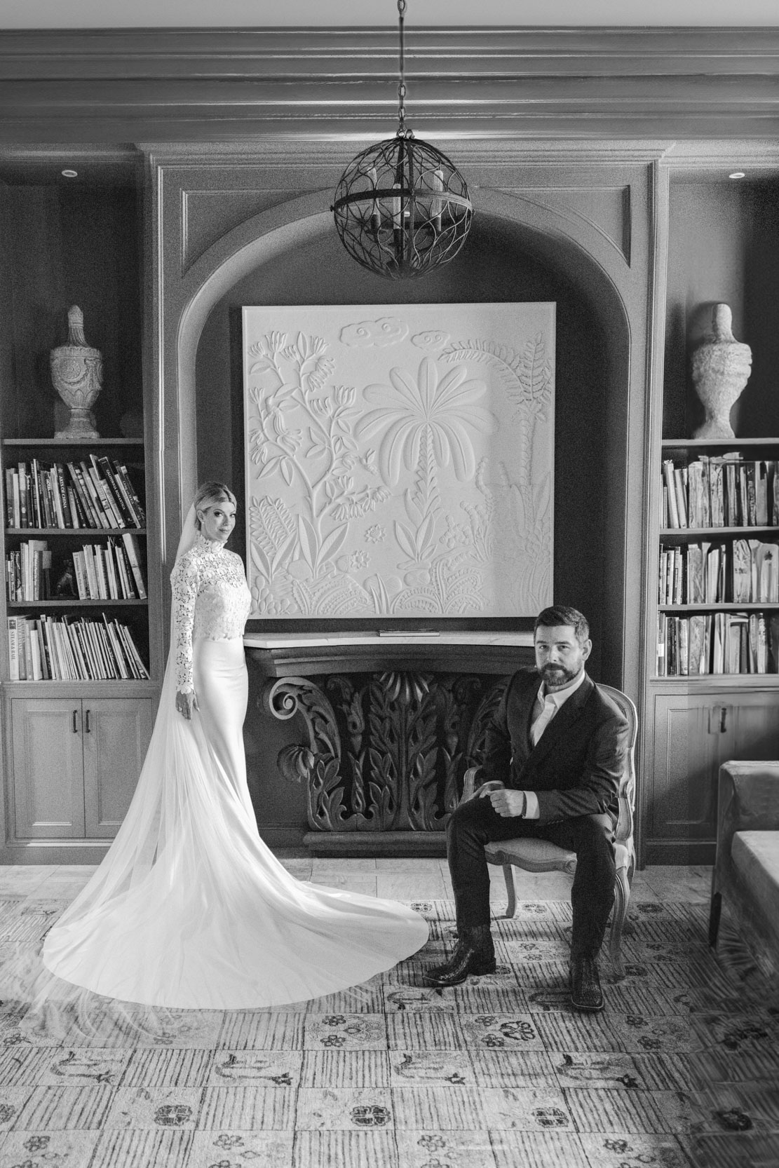 bride and groom posing in elegant library room at the Southern Hotel in Covington, Louisiana