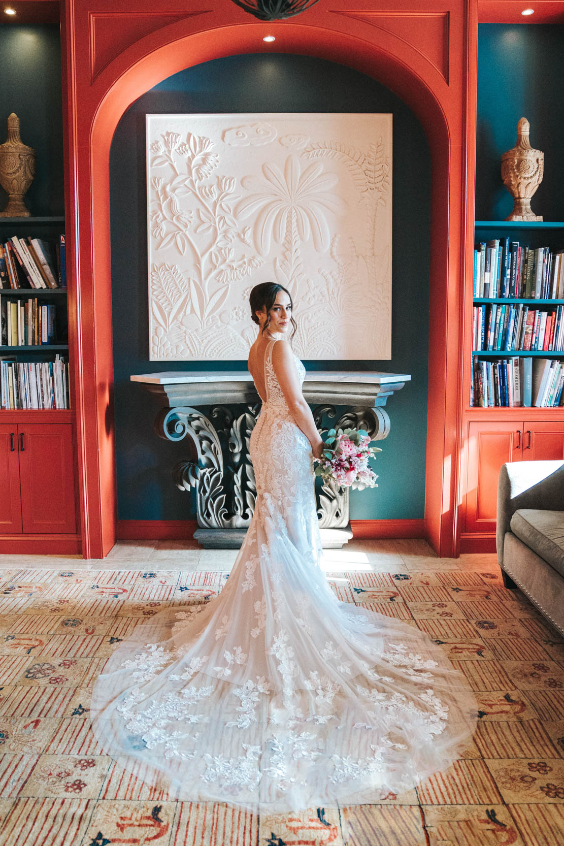 bride posing with white wedding gown inside The Southern Hotel in Covington, Louisiana