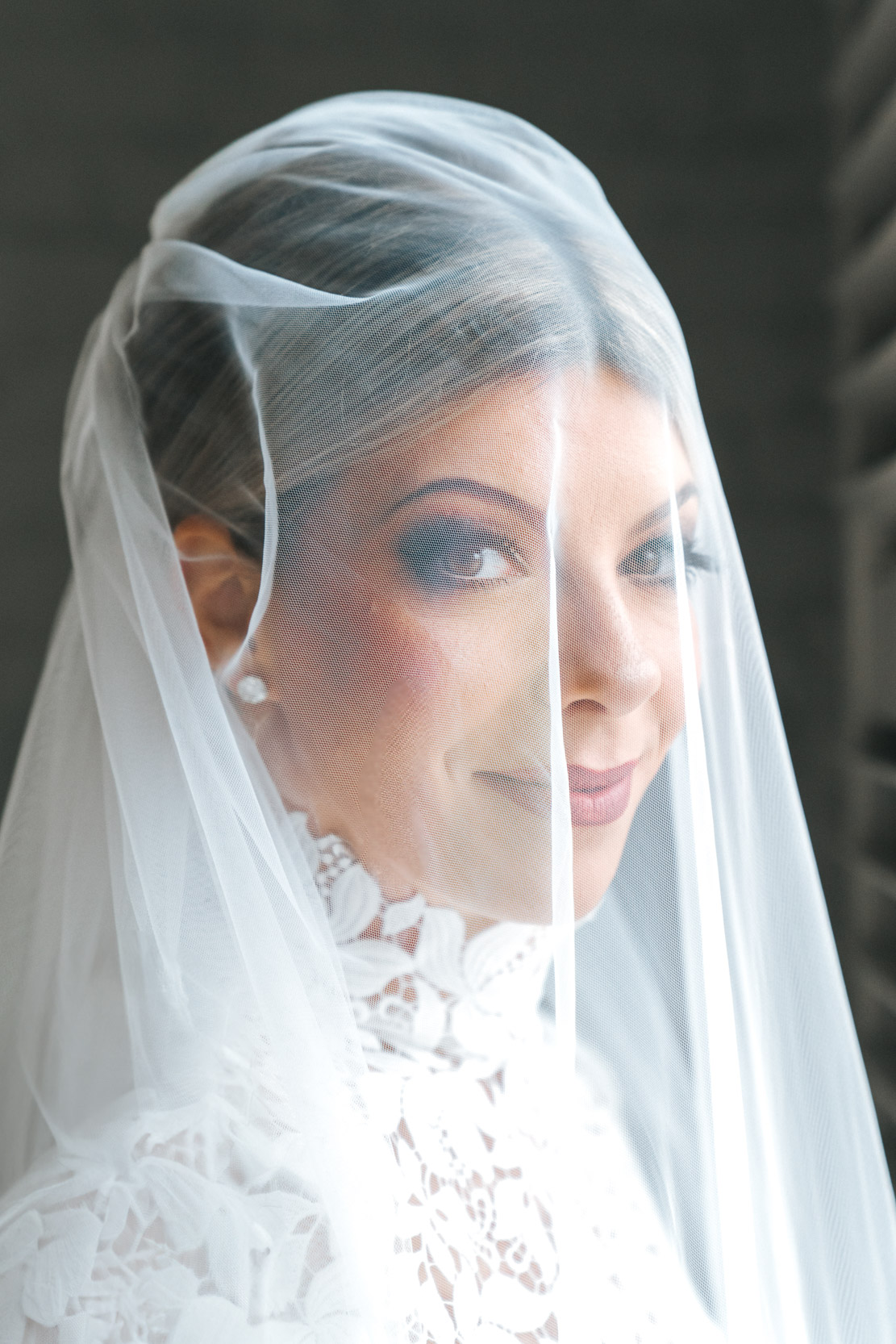 stunning bride wearing veil over her head at the Southern Hotel in Covington, Louisiana