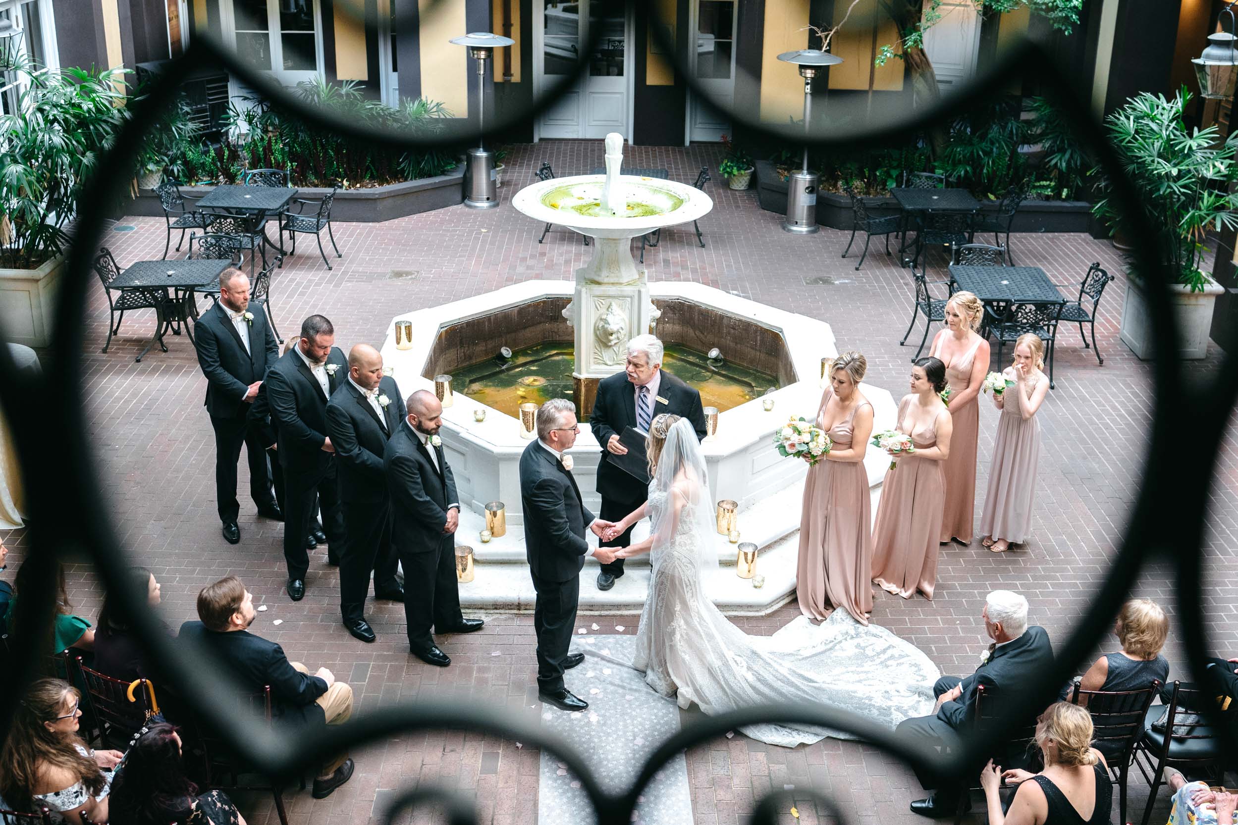 wedding ceremony in the courtyard of Hotel Mazarin in The French Quarter of New Orleans