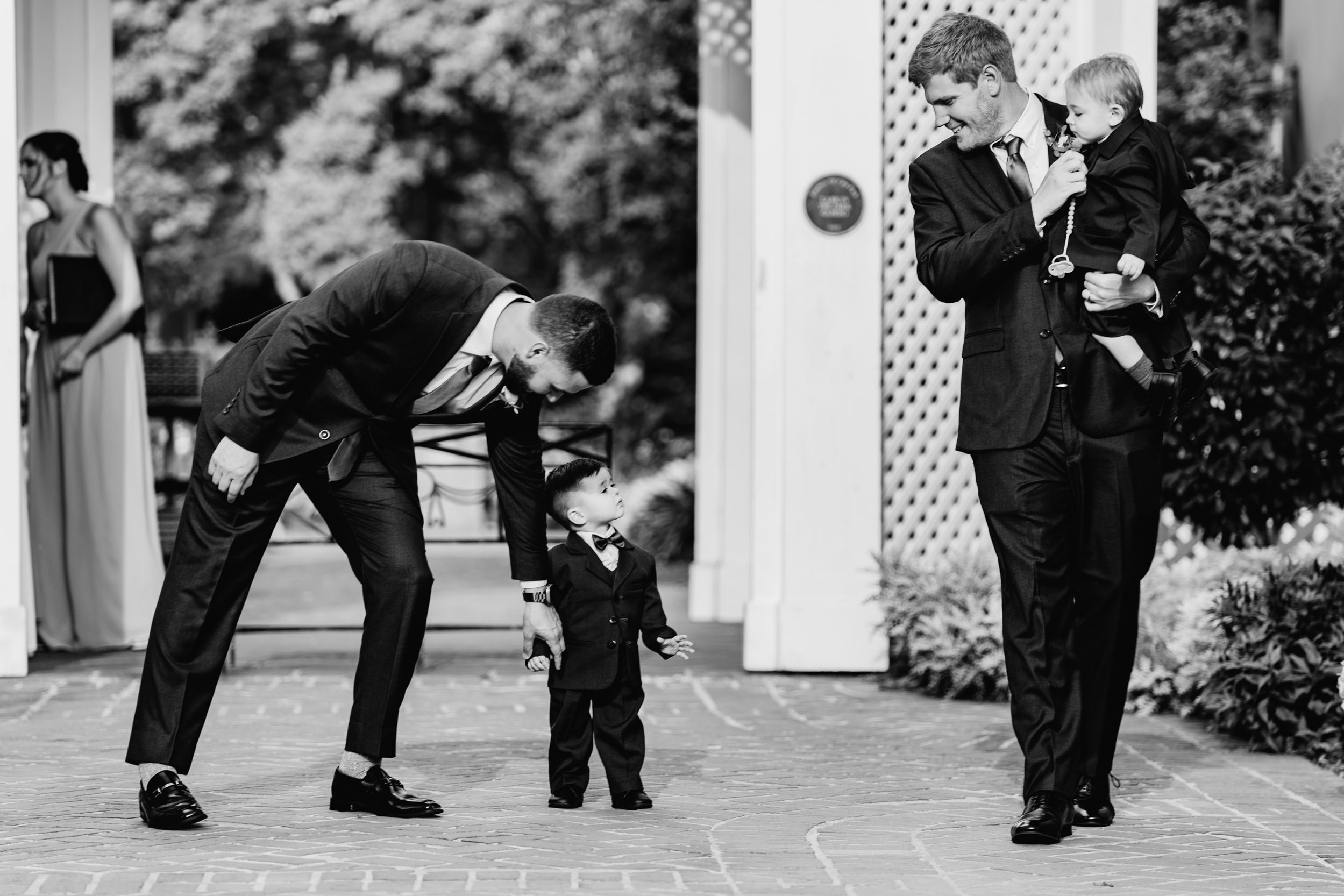 fathers and their children on wedding day at Pavilion of the Two Sisters in New Orleans