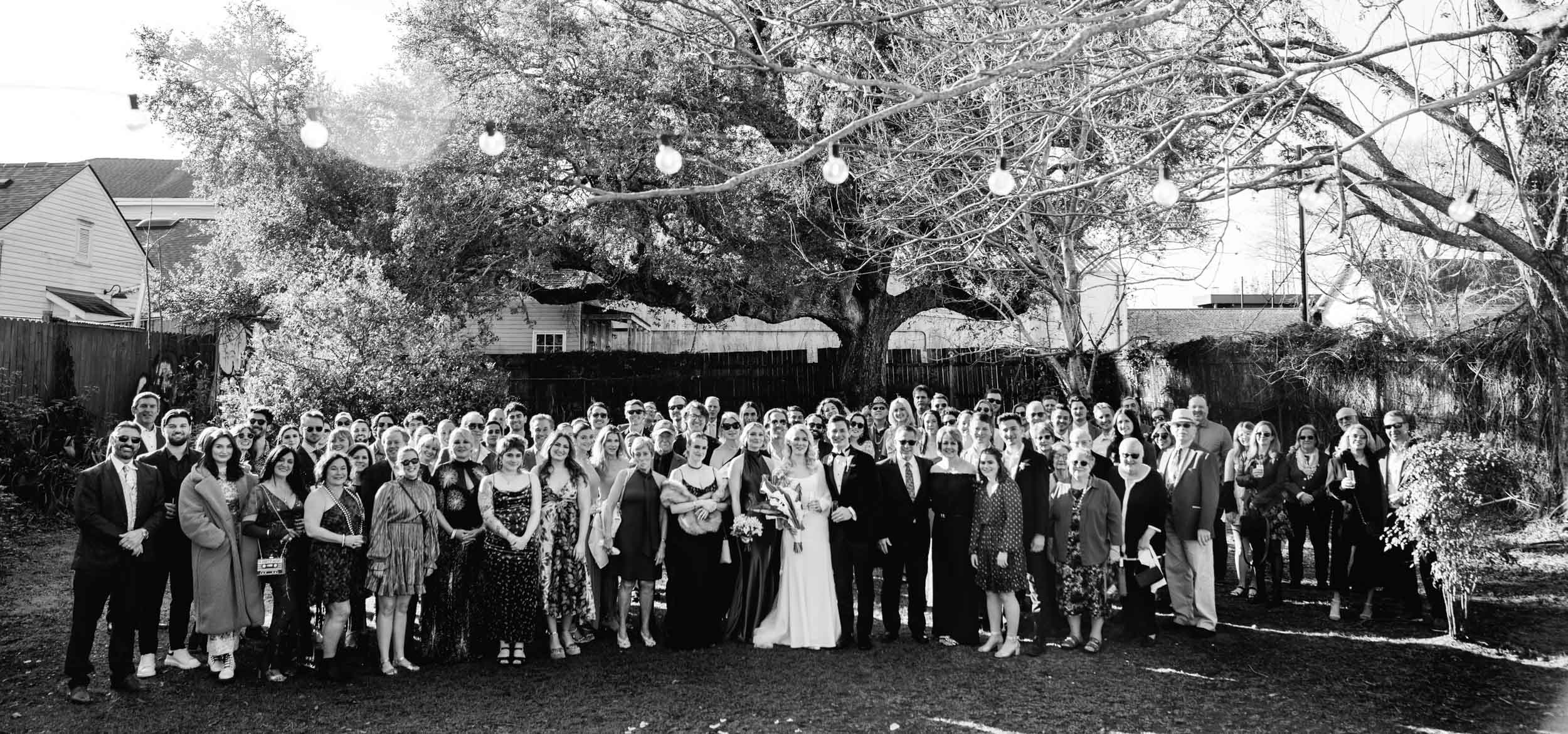 large family photo on wedding day at Clouet Gardens in the Bywater of New Orleans