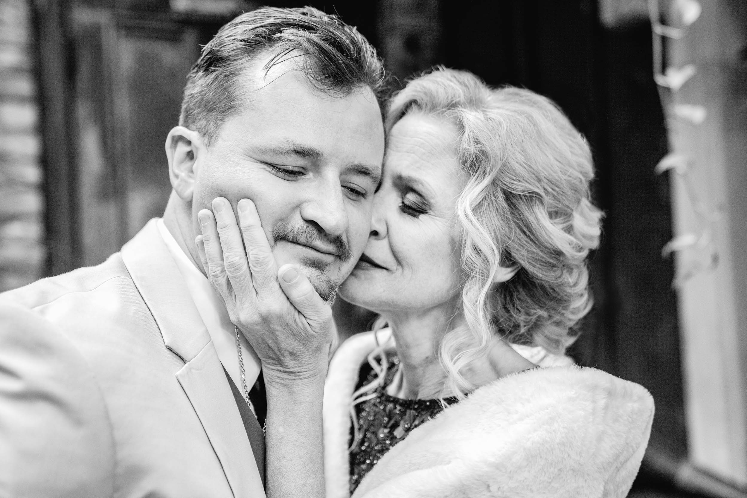 mother and groom crying on wedding day at the Historic Swoop Duggins House in New Orleans