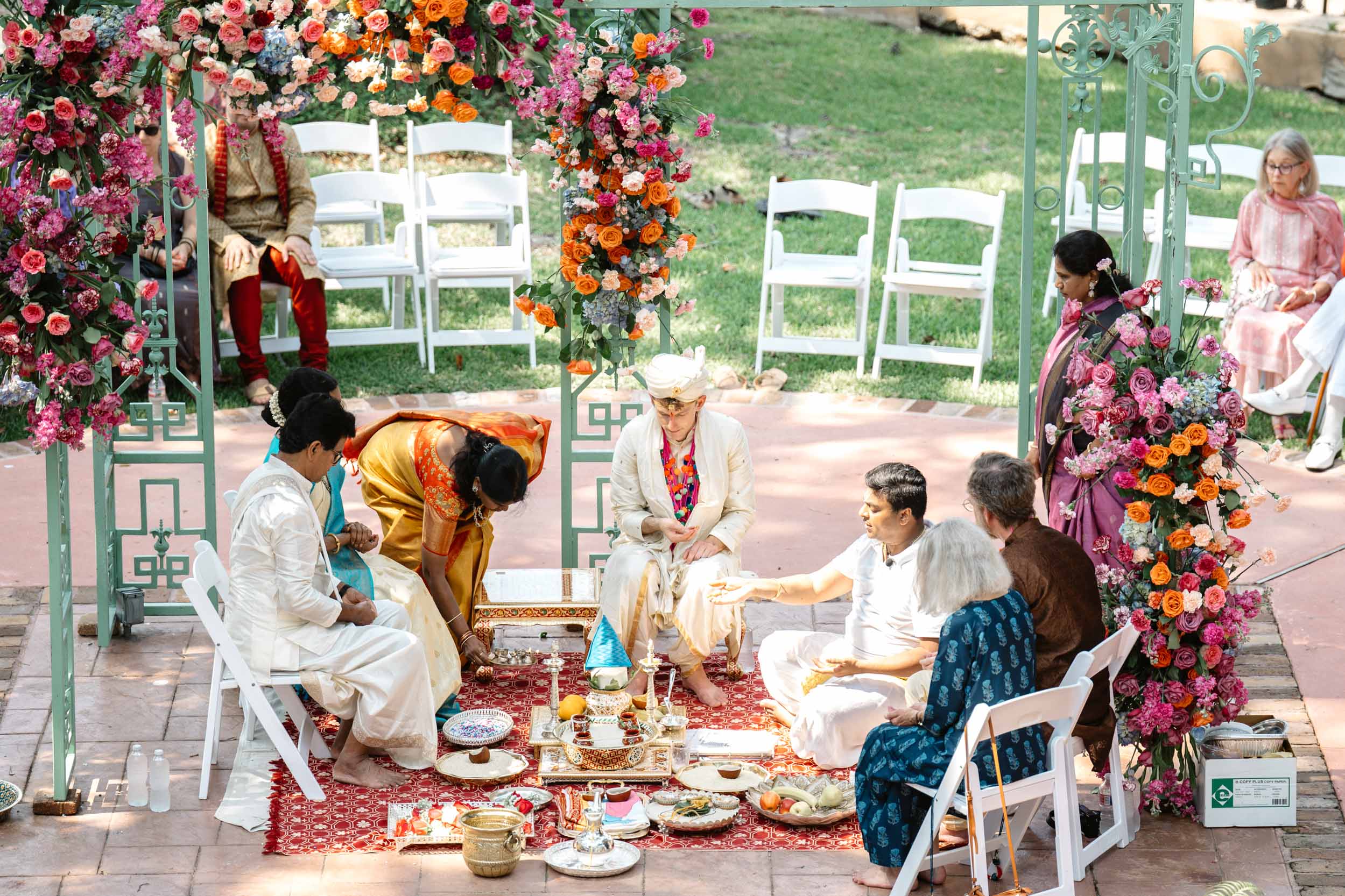 American Indian groom partaking in nikah ceremony at at Derbès Mansion in New Orleans