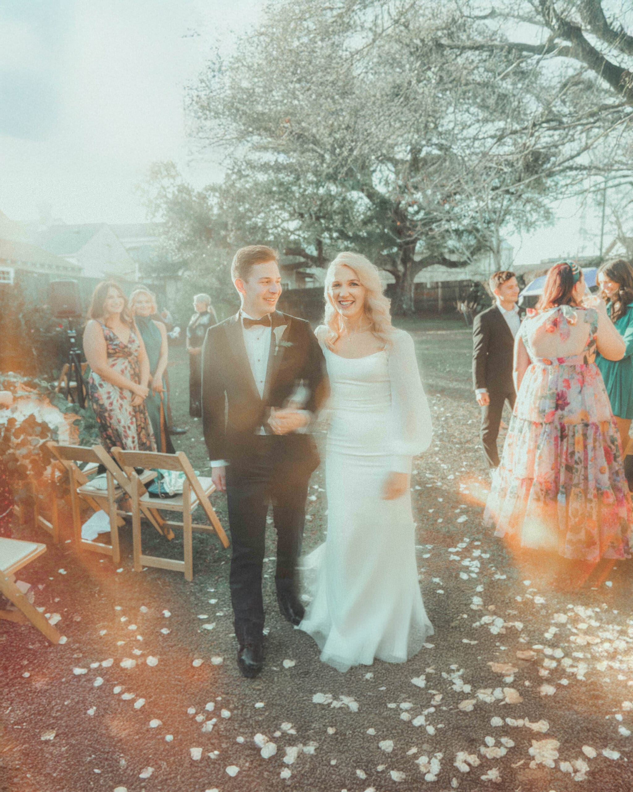 super-8-wedding-film-clouet-gardens-marigny-new-orleans copy Super 8 wedding film still of a couple walking at Clouet Gardens in the Bywater, New Orleans.